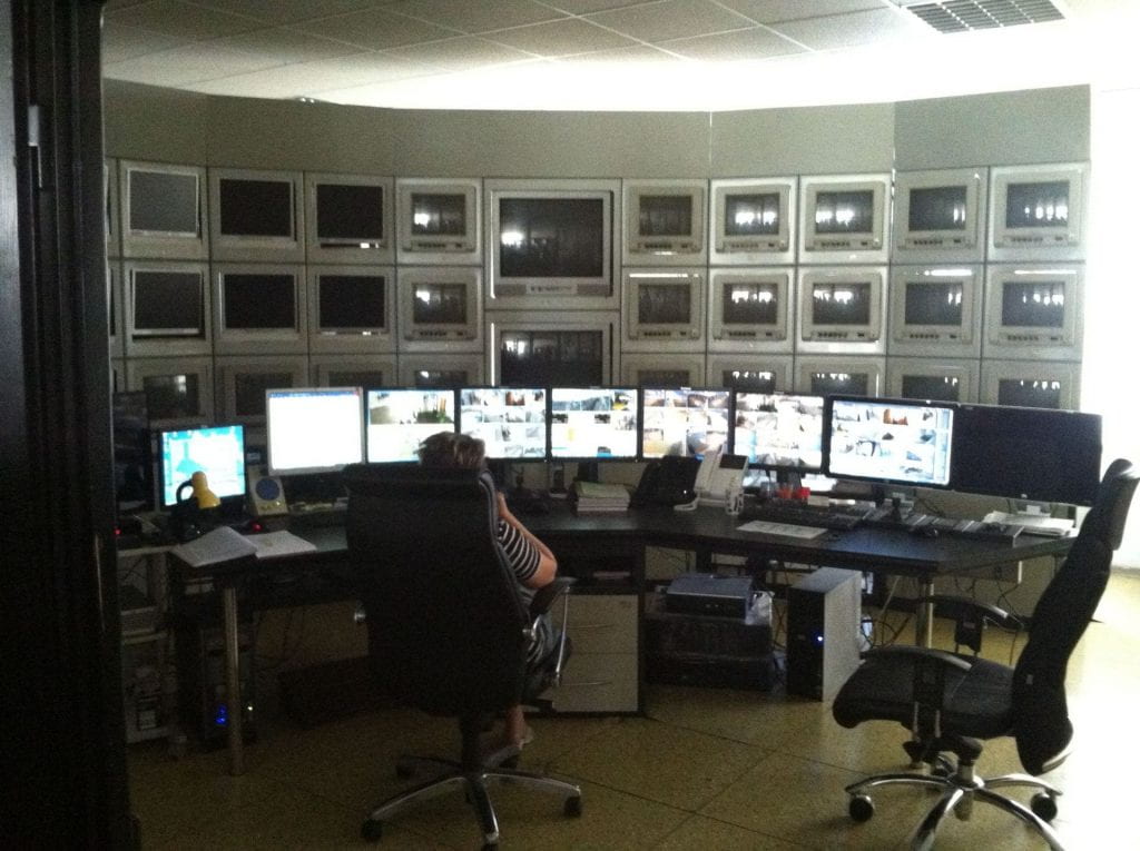 Multiple monitors showing dam operations in real-time